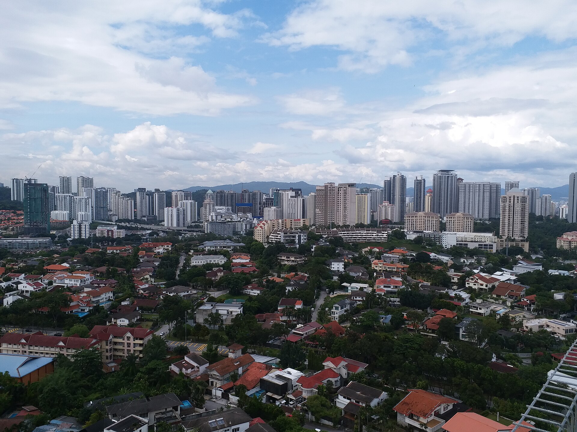 Mont Kiara towers and surrounding Kuala Lumpur neighbourhood