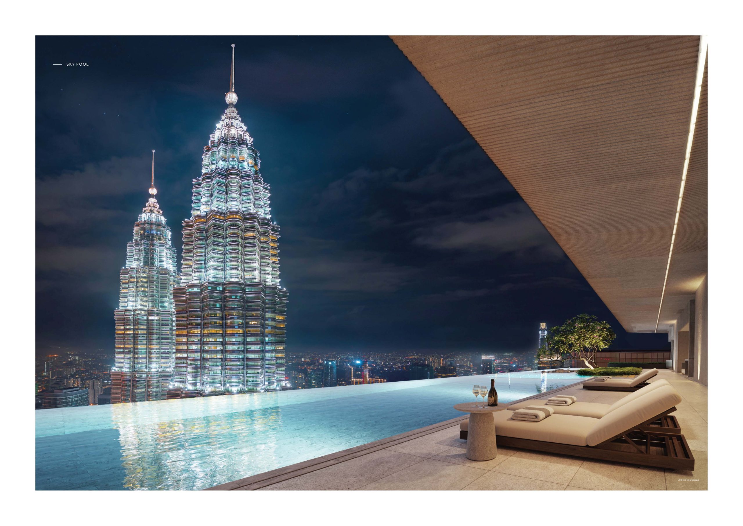 CloutHaus sky pool overlooking the Petronas Twin Towers at night